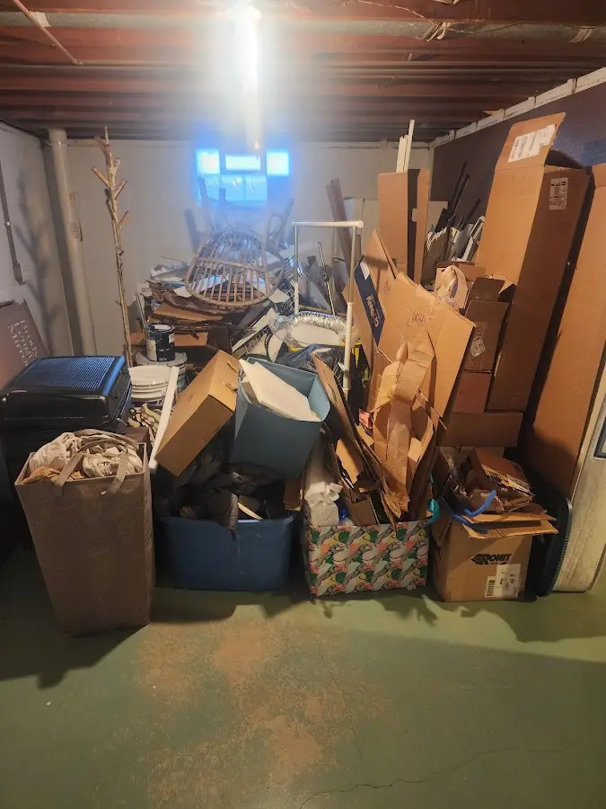 Roll-off dumpster container at job site for 4 Yard Dumpster Rental in Baker